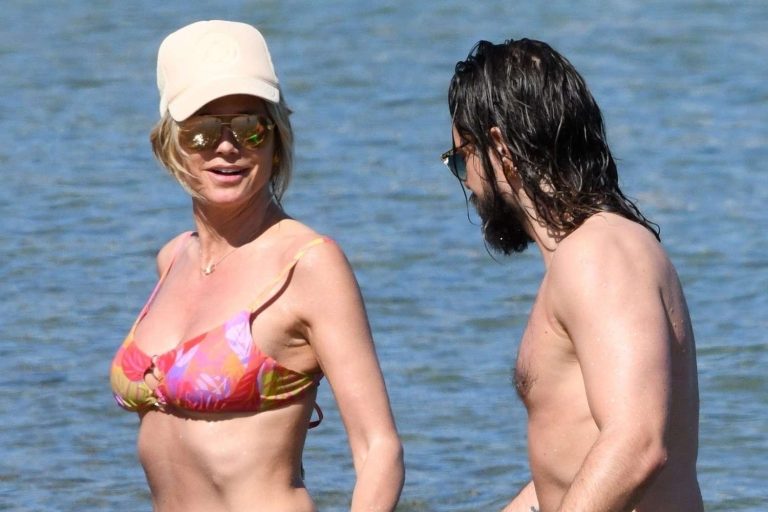 The supermodel, 51, was seen spending some time on the shore with her hubby and children on the island of Sardinia before flying off to France.